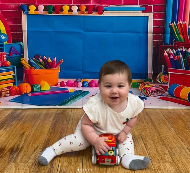 A baby exploring the infant room