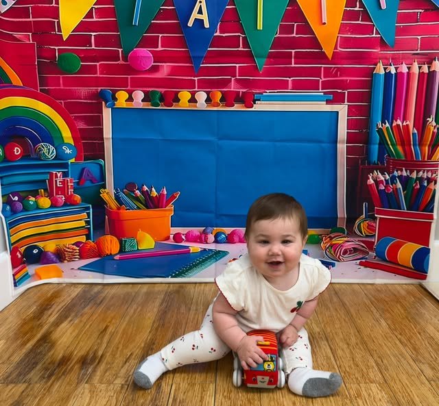 A baby in the infant room at Learn and Smile